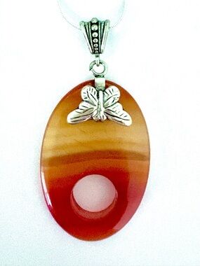 2 1/2 inch, Orange Lace  Agate, pendant , on a silver chain.